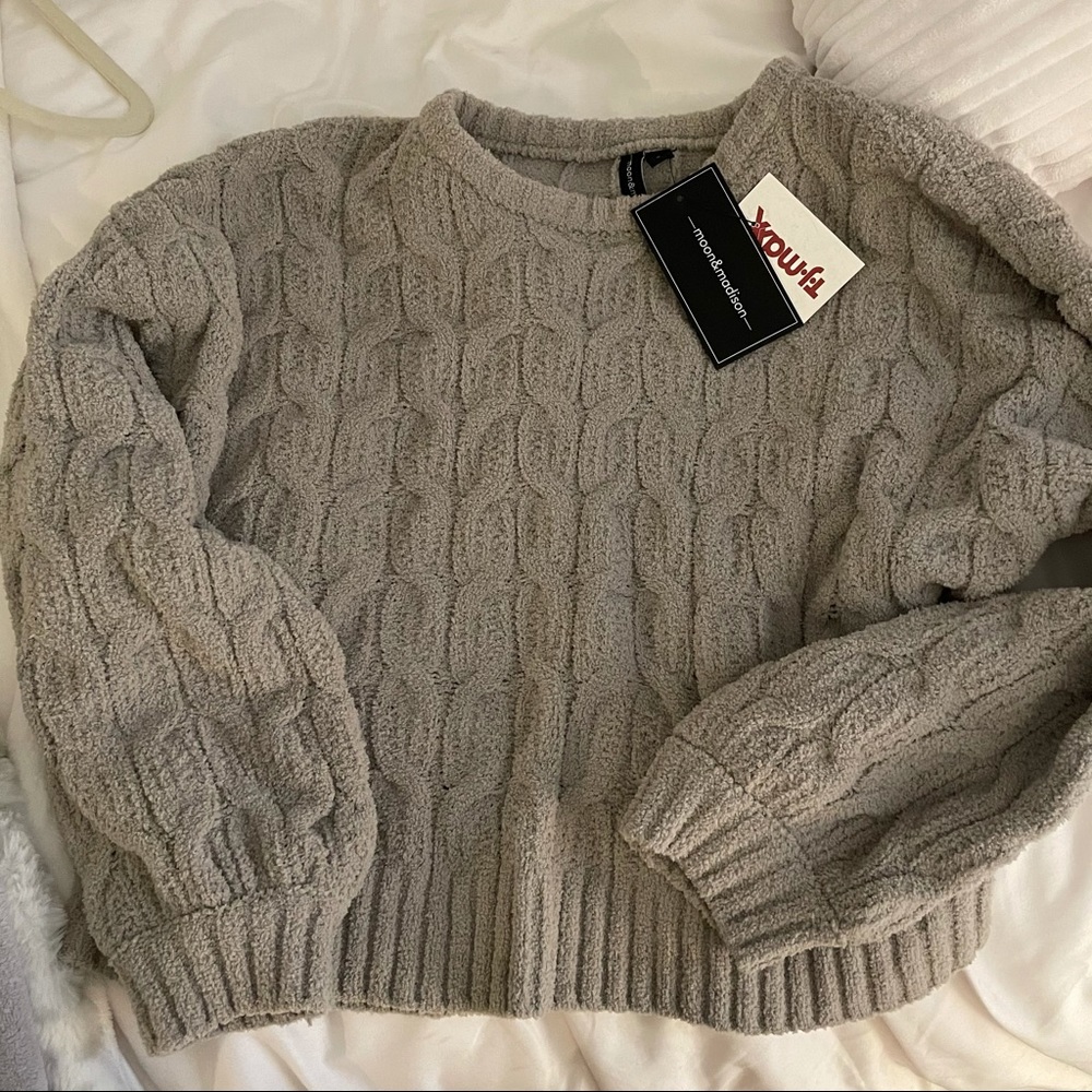 green sweater